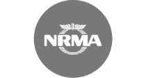 The NRMA logo, set against a gray backdrop, showcases a circular design with stylized wings above the letters "NRMA." Emphasizing quality and reliability, it's as foundational to travel as work health and safety courses are to workplace excellence.
